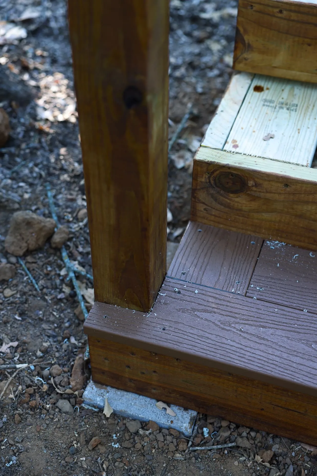Composite stair tread and fascia wrapping the stair box on Greg's Grandview, TX deck