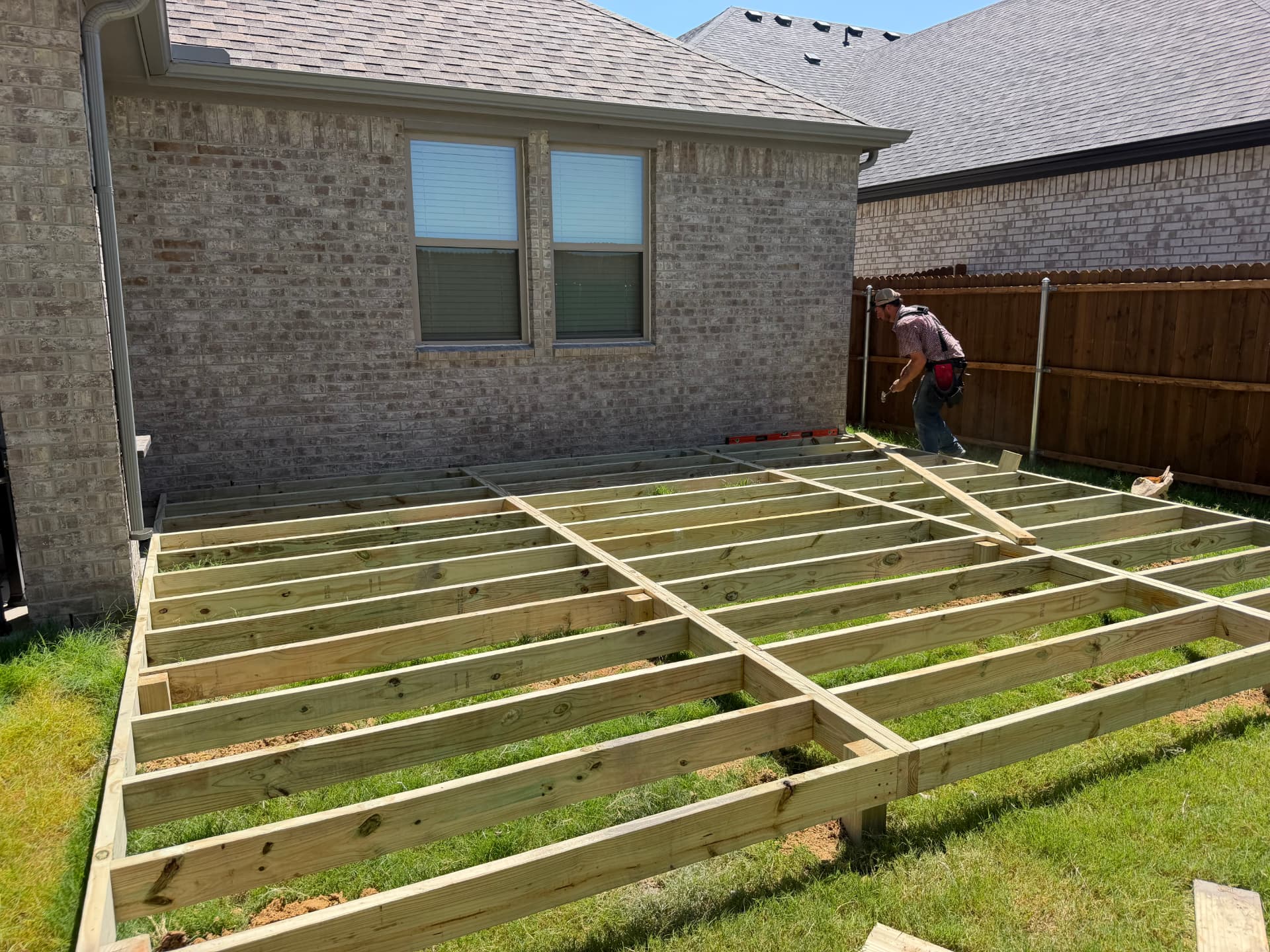 Completed deck substructure framing before decking is installed