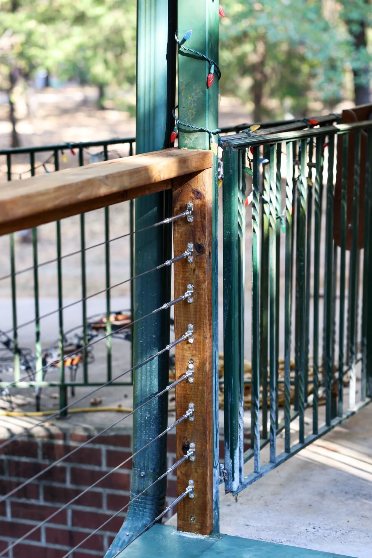 Cable railing tied into the existing covered patio columns